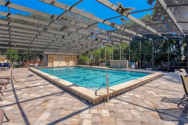 community pool with a patio area