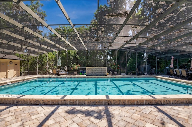 community pool with a patio and a lanai