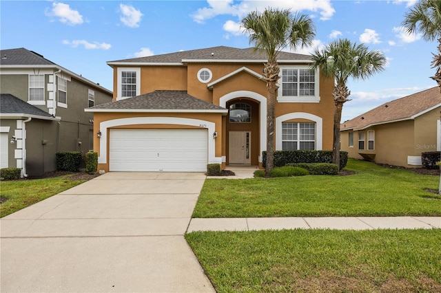 view of front of house with a garage and a front yard