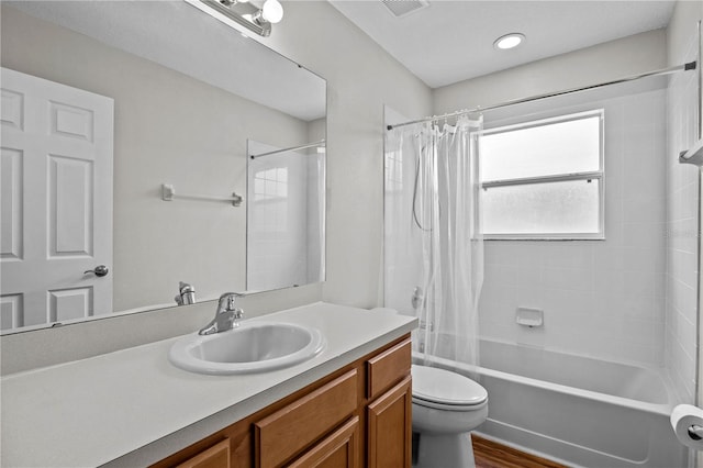 full bathroom featuring wood-type flooring, vanity, toilet, and shower / bathtub combination with curtain