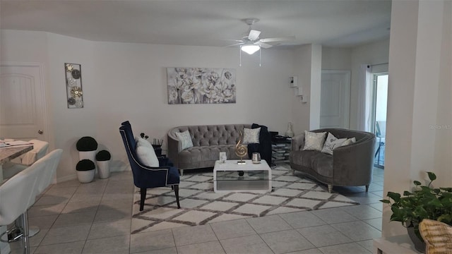 living room with ceiling fan and tile floors