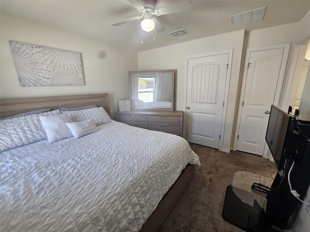 carpeted bedroom featuring ceiling fan