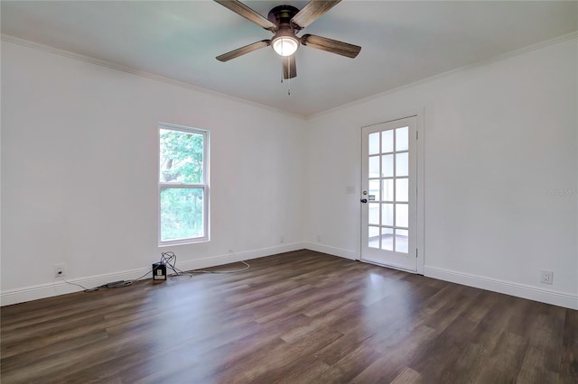 spare room featuring ceiling fan, ornamental molding, and dark hardwood / wood-style flooring