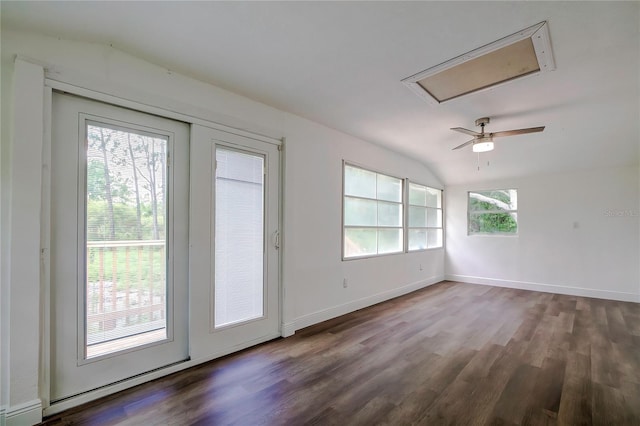 doorway to outside with hardwood / wood-style flooring and vaulted ceiling