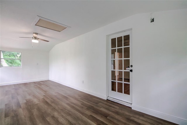 unfurnished room with ceiling fan, wood-type flooring, and lofted ceiling