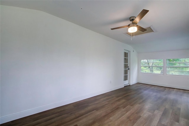 spare room with vaulted ceiling, ceiling fan, and dark hardwood / wood-style floors