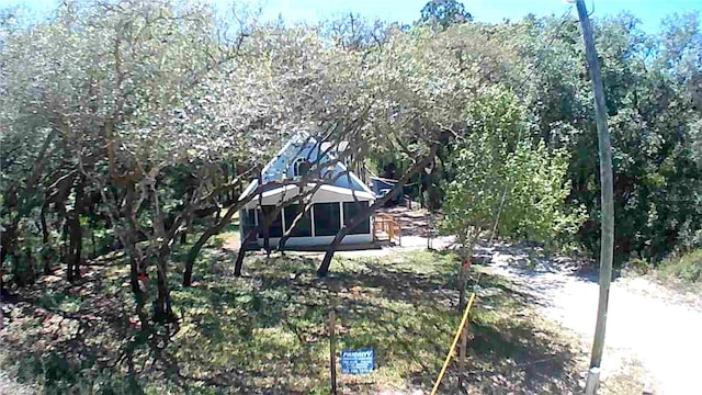 back of house with a sunroom