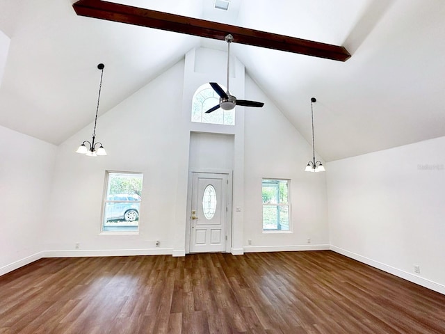 interior space featuring hardwood / wood-style floors, ceiling fan with notable chandelier, beam ceiling, and high vaulted ceiling