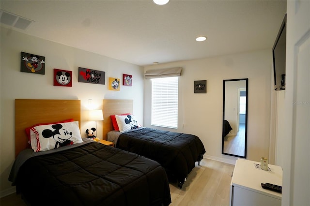 bedroom featuring light hardwood / wood-style flooring