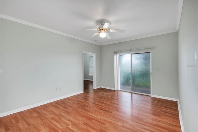 unfurnished room with ornamental molding, ceiling fan, and light wood-type flooring