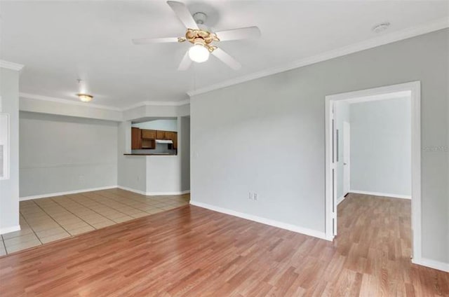 interior space featuring light hardwood / wood-style flooring, crown molding, and ceiling fan