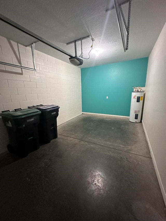 garage featuring a garage door opener and electric water heater