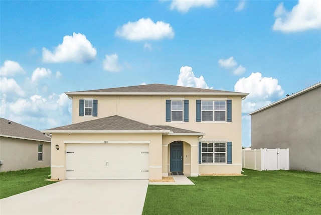 view of front facade with a garage and a front yard