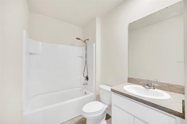 full bathroom featuring toilet, tub / shower combination, vanity with extensive cabinet space, and tile flooring