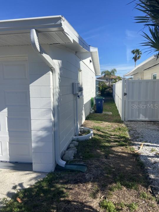 view of property exterior with a garage