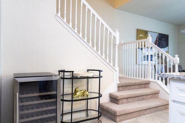 staircase featuring tile floors