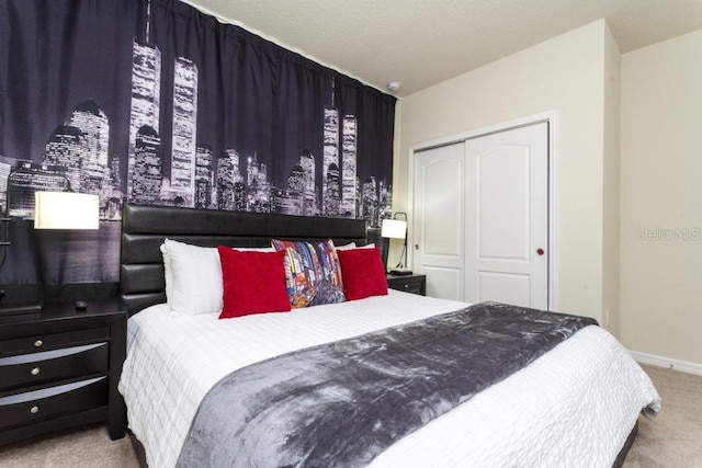 carpeted bedroom with a closet