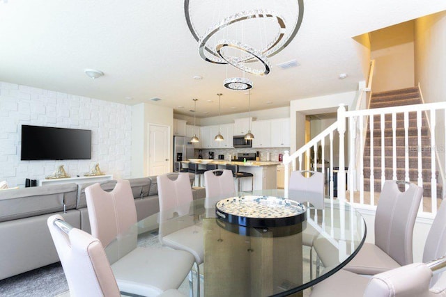 dining room featuring a notable chandelier