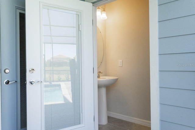 entryway with tile flooring