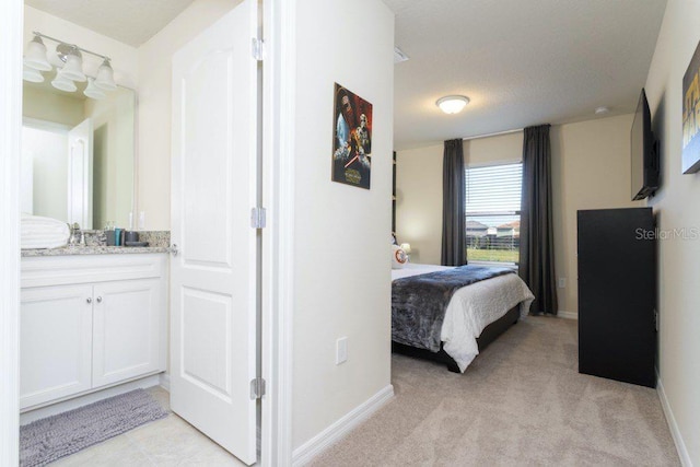 bedroom featuring light colored carpet