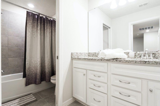 full bathroom featuring oversized vanity, shower / tub combo, toilet, and tile flooring