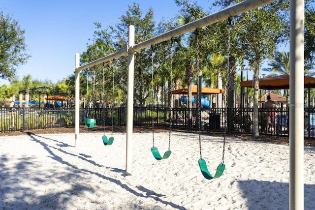 view of property's community featuring a playground