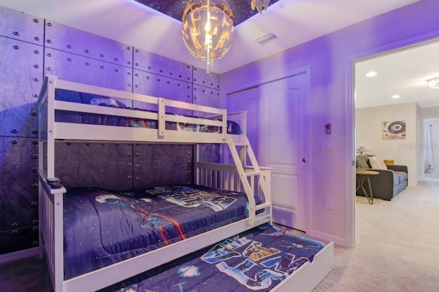 bedroom featuring a closet and carpet