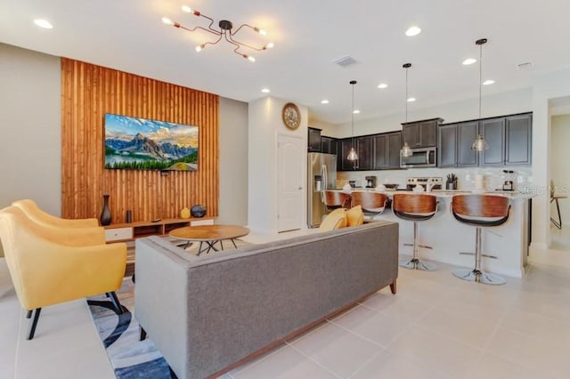 living room featuring light tile floors