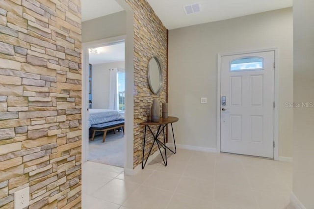 view of tiled foyer entrance