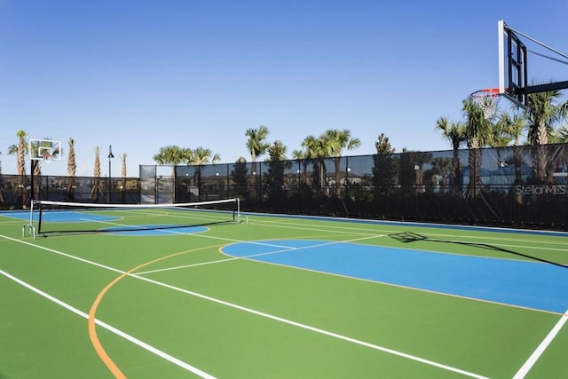 view of basketball court with tennis court