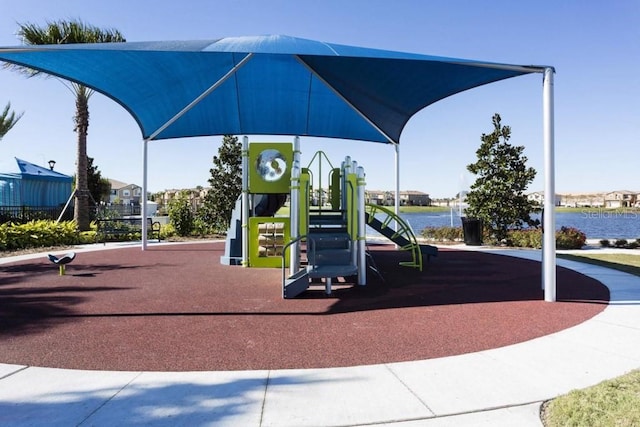 view of play area with a water view