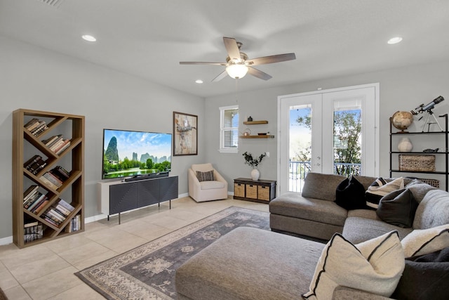 living room with ceiling fan, light tile patterned floors, and french doors