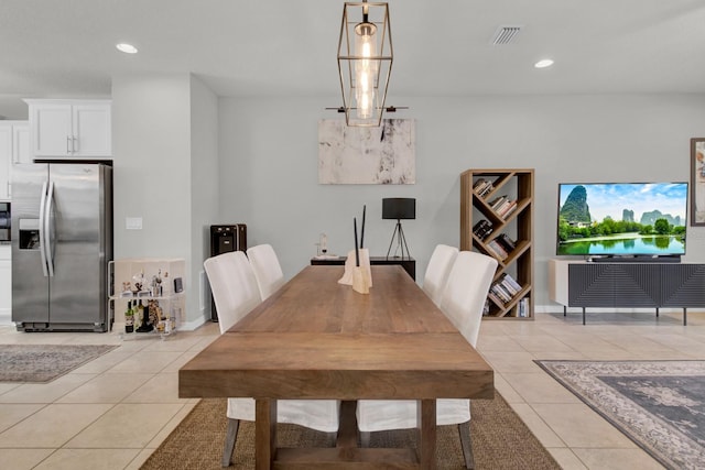 dining space with light tile patterned floors