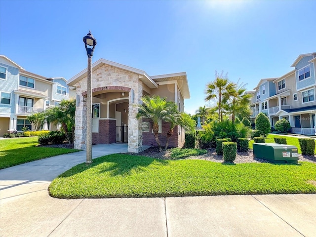 view of front of home with a front yard