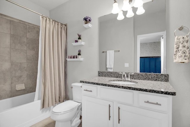 full bathroom featuring shower / bath combo, vanity, and toilet