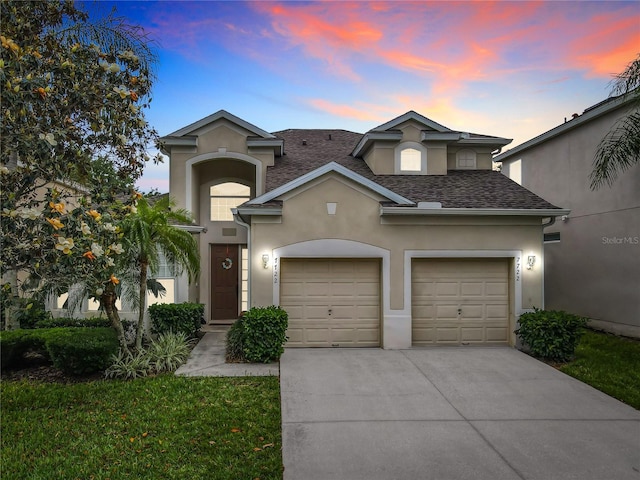 view of front of property with a garage