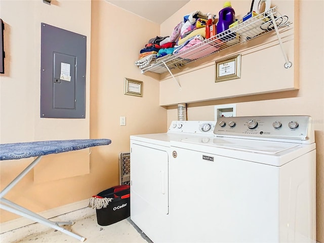 laundry room featuring hookup for a washing machine and washing machine and clothes dryer