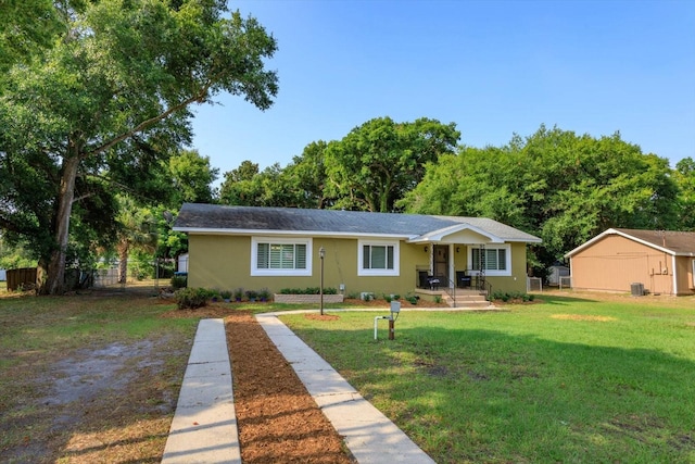 ranch-style house with a front lawn