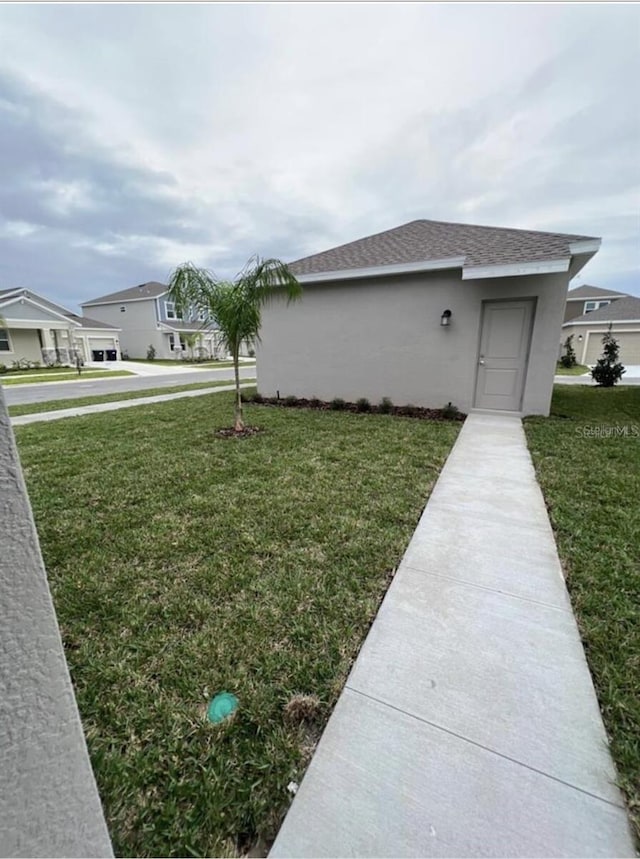 view of front of house with a front lawn