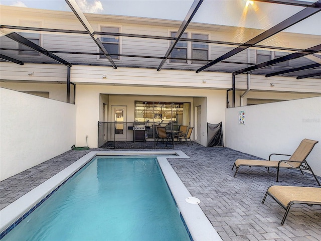 view of pool featuring a patio