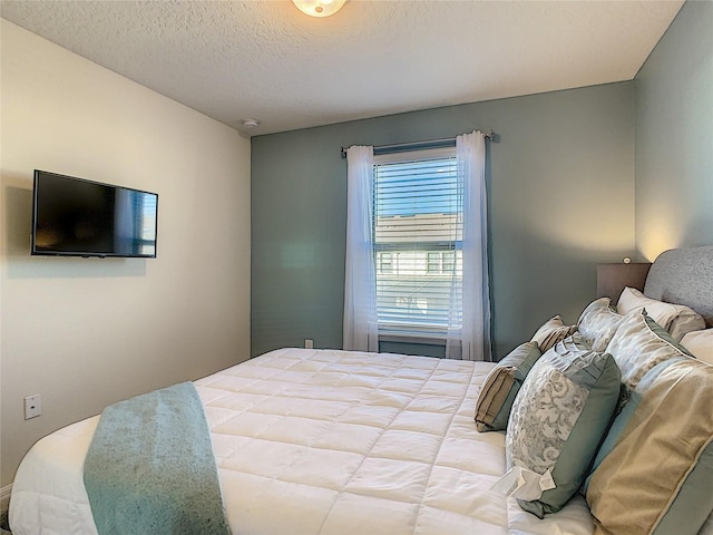 bedroom with a textured ceiling