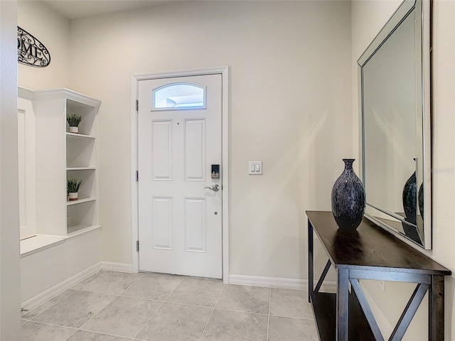 foyer with light tile floors