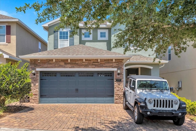 view of front of property with a garage