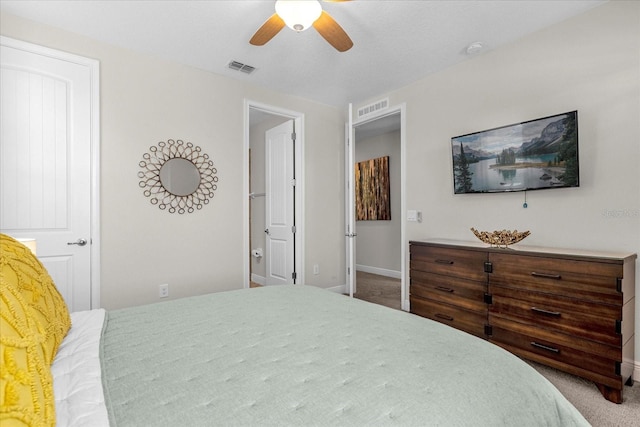 bedroom featuring ceiling fan and carpet floors