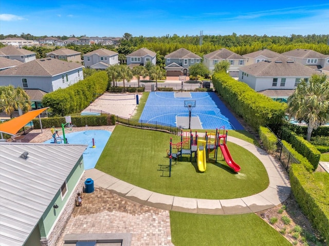 exterior space featuring a playground and a lawn