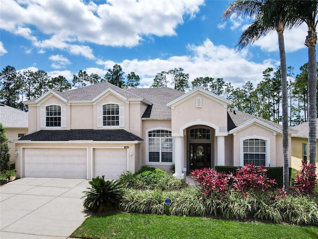 view of front of property featuring a garage