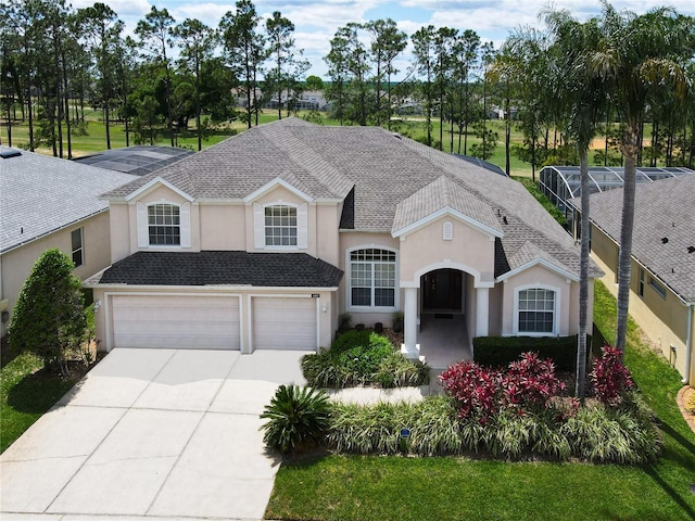 view of front of property with a garage