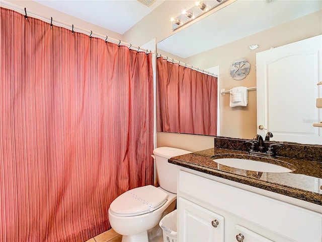 bathroom with toilet and oversized vanity