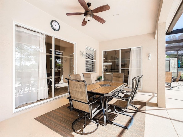 view of patio featuring ceiling fan