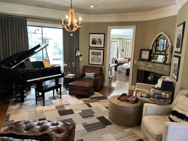 living room with crown molding and an inviting chandelier